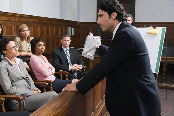 Experienced trial attorney presenting evidence in a personal injury case in a federal courtroom